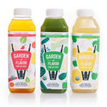 Three bottles of Garden of Flavor beverages